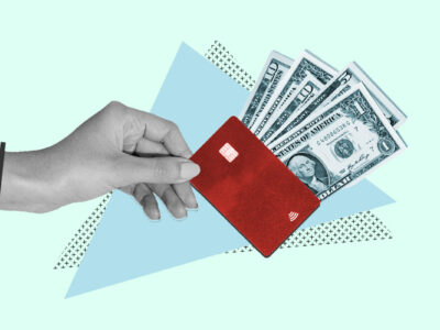 Credit-card shaped wallet full of money representing paying in full