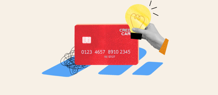 Lightbulb sticker stuck on credit card representing how to use a credit card