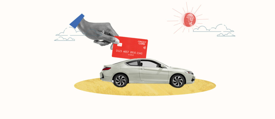 Credit card being used to buy a car